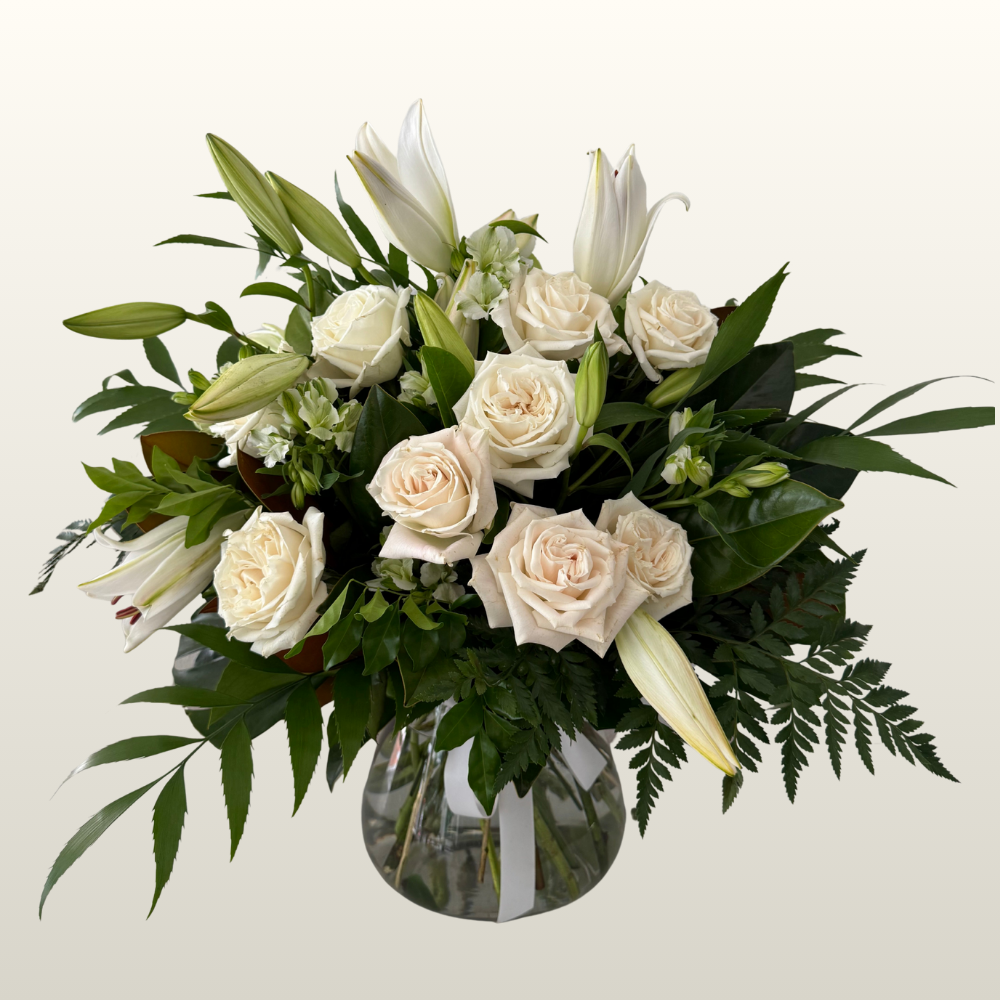 Bouquet of white roses and lilies